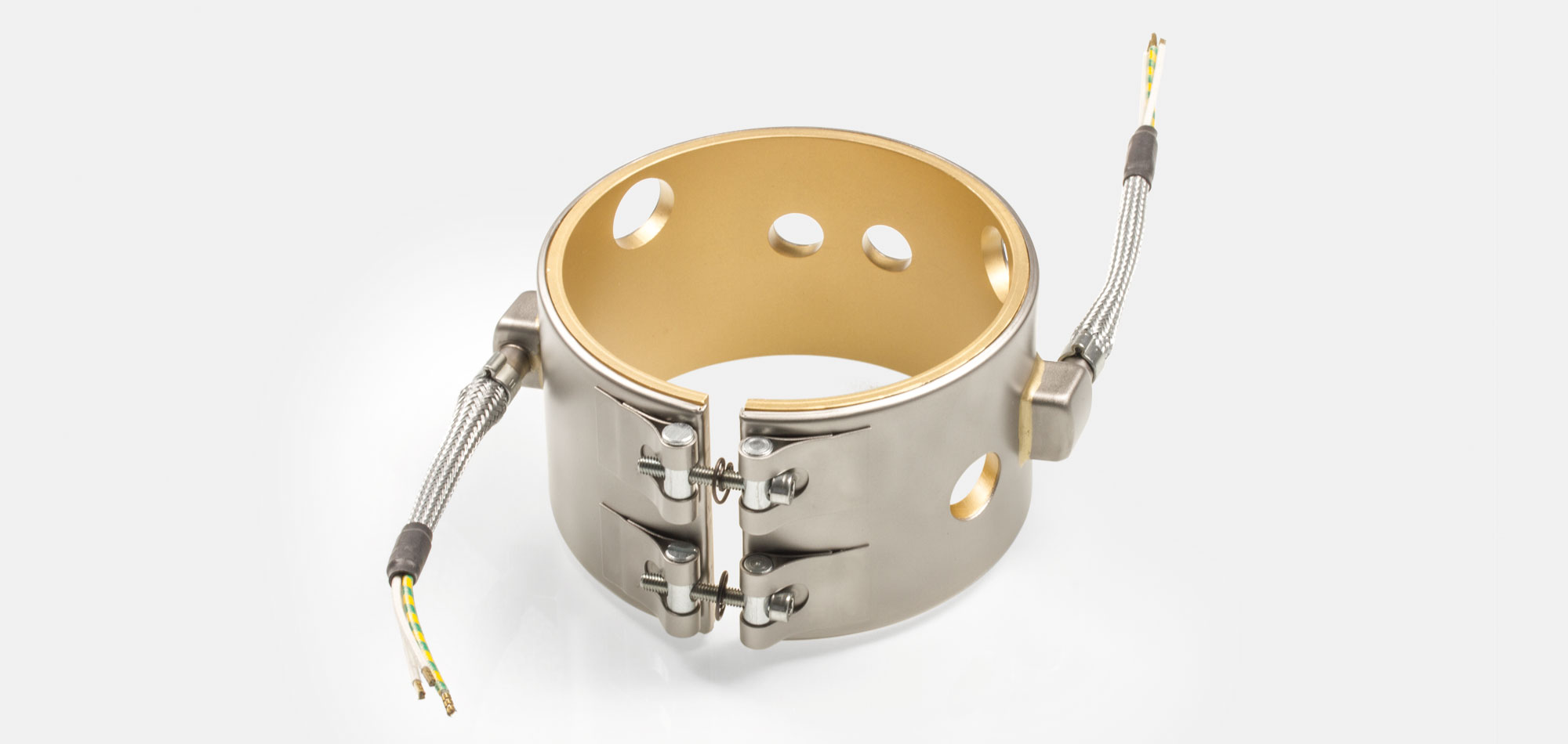 Düsenheizband, für Temperatur bis 450°C/550°C, Spitzguss, energieeffiziente Ausführung, homogener Wärmeverlauf, Bohrungen, Aussparungen, Wärmefühlerhaltung, integriertes Thermoelement, Sonderkontur, enge Einbauverhältnisse, Kabelextrusion