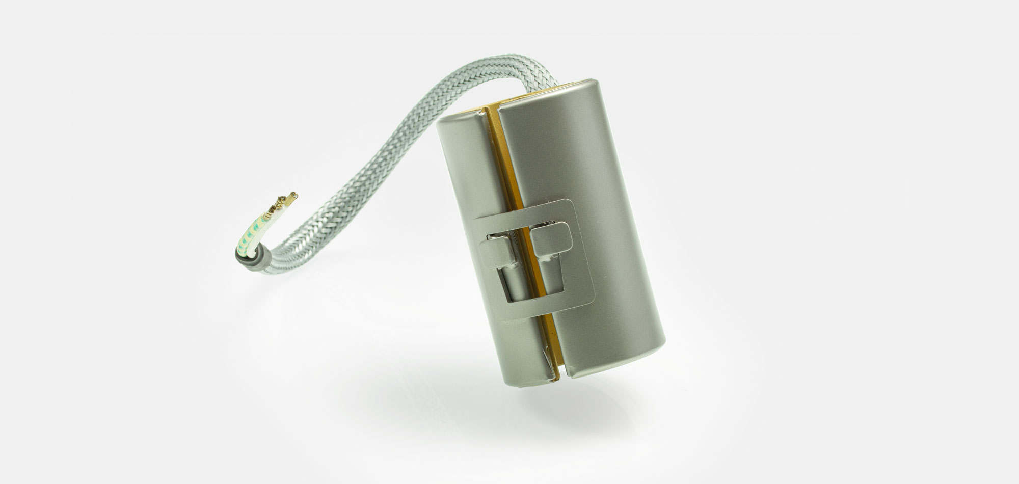 Düsenheizband, für Temperatur bis 450°C/550°C, Spitzguss, energieeffiziente Ausführung, homogener Wärmeverlauf, Bohrungen, Aussparungen, Wärmefühlerhaltung, integriertes Thermoelement, Sonderkontur, enge Einbauverhältnisse, Kabelextrusion