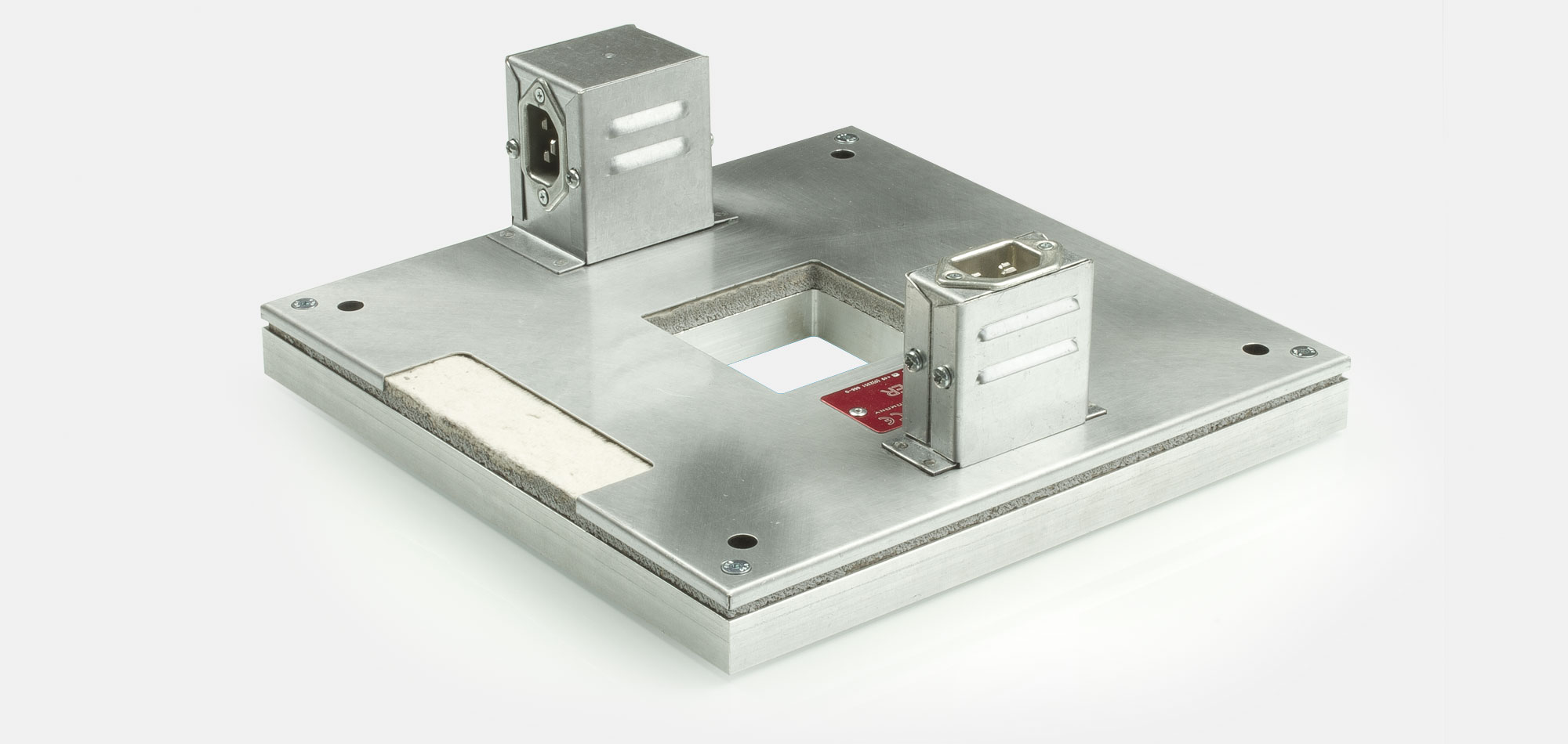 Werkzeugbeheizung, Flachheizung, Rahmenheizung, für Temperaturen bis 450°C/550°C, Extrusion, Spritzguss, Kunststofftechnik, Bohrungen, Aussparungen, Wärmefühlerhalterung, energieeffizient, homogener Wärmeverlauf, konturgerechte Anlage