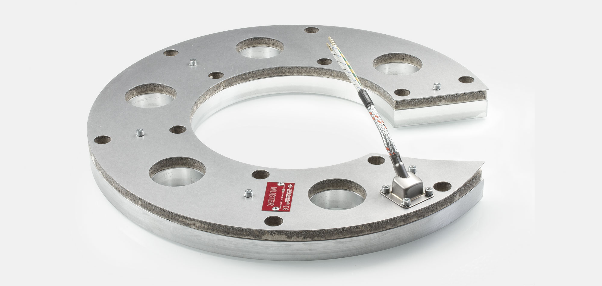 Werkzeugbeheizung, Flachheizung, Rahmenheizung, für Temperaturen bis 450°C/550°C, Extrusion, Spritzguss, Kunststofftechnik, Bohrungen, Aussparungen, Wärmefühlerhalterung, energieeffizient, homogener Wärmeverlauf, konturgerechte Anlage