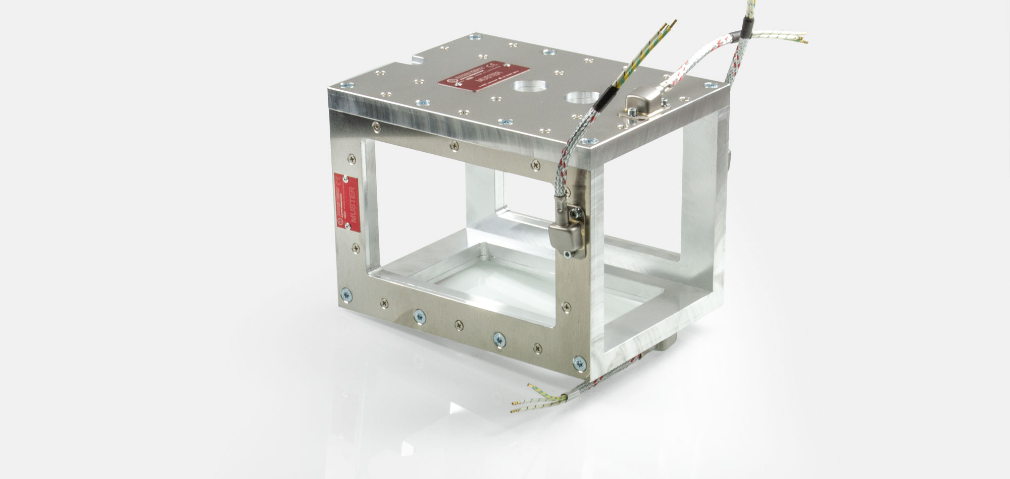 Werkzeugbeheizung, Flachheizung, Rahmenheizung, für Temperaturen bis 450°C/550°C, Extrusion, Spritzguss, Kunststofftechnik, Bohrungen, Aussparungen, Wärmefühlerhalterung, energieeffizient, homogener Wärmeverlauf, konturgerechte Anlage