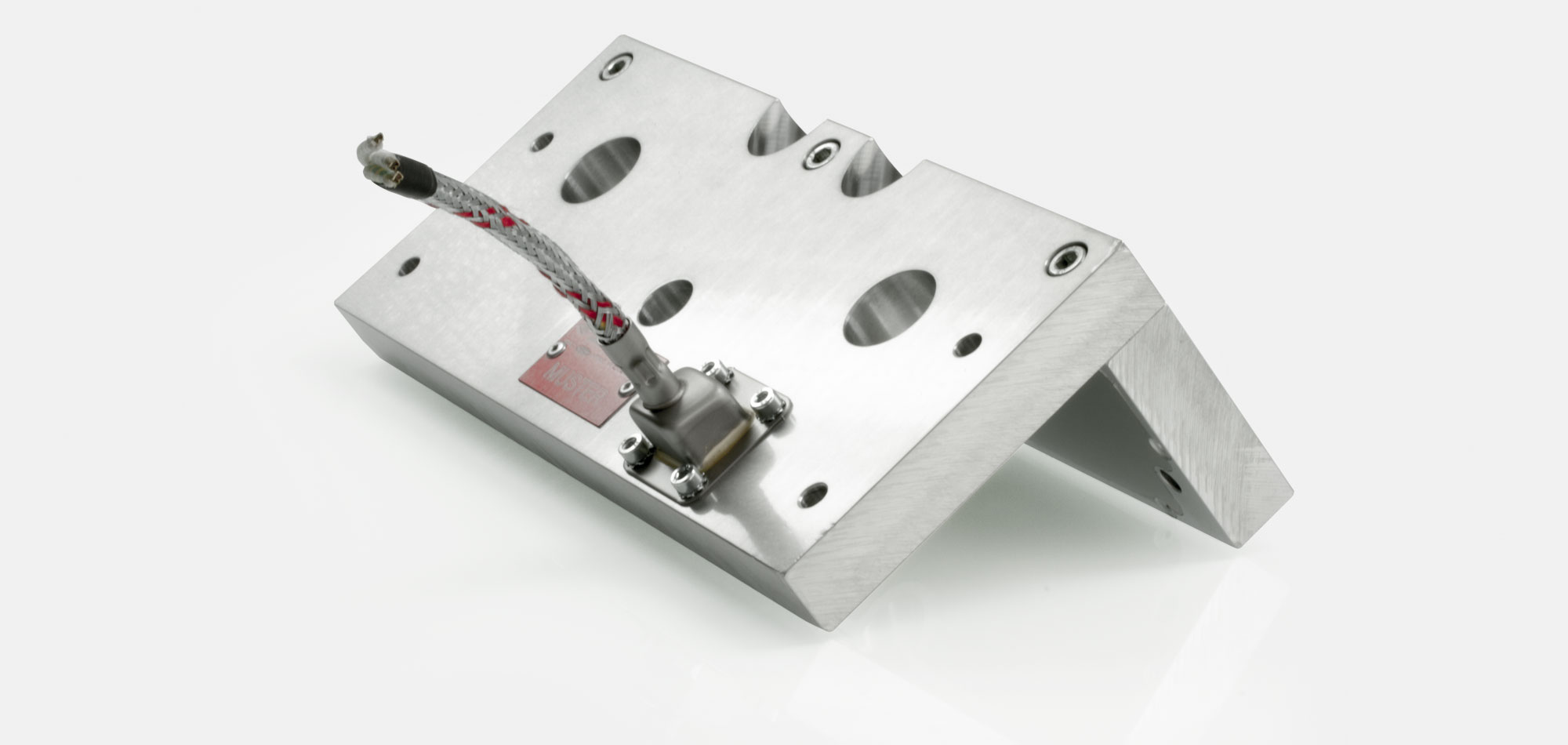 Werkzeugbeheizung, Flachheizung, Rahmenheizung, für Temperaturen bis 450°C/550°C, Extrusion, Spritzguss, Kunststofftechnik, Bohrungen, Aussparungen, Wärmefühlerhalterung, energieeffizient, homogener Wärmeverlauf, konturgerechte Anlage