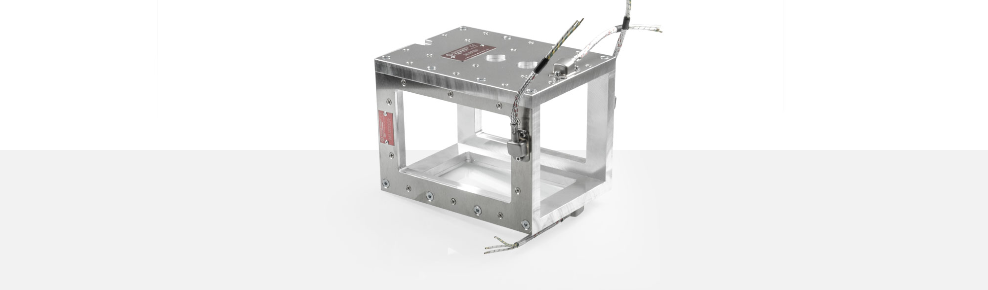 Werkzeugbeheizung, Flachheizung, Rahmenheizung, für Temperaturen bis 450°C/550°C, Extrusion, Spritzguss, Kunststofftechnik, Bohrungen, Aussparungen, Wärmefühlerhalterung, energieeffizient, homogener Wärmeverlauf, konturgerechte Anlage